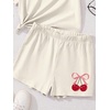 image:imageRoseSeek Girls 2 Piece Outfits Cherry Bow Graphic Tee Shirt and Shorts Set Cute Summer OutfitsBeige