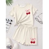 image:imageRoseSeek Girls 2 Piece Outfits Cherry Bow Graphic Tee Shirt and Shorts Set Cute Summer OutfitsBeige