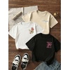 image:imageRoseSeek Girls 3 Packs Graphic Print T Shirts Set Crew Neck Short Sleeve T Shirt Oversized Summer TopsBeige White Black